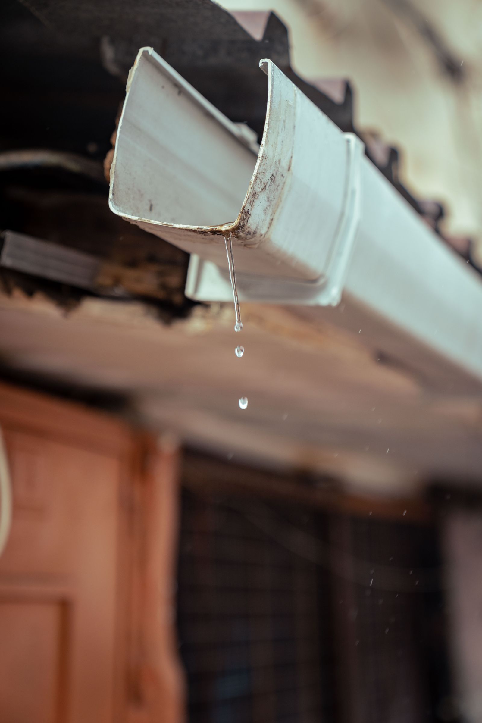 Rainwater flowing through a gutter